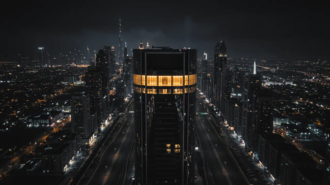 A building at night with lit windows